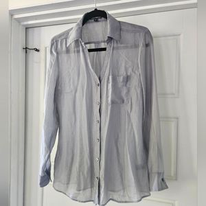 Women's medium ligh,t button-down shirt.